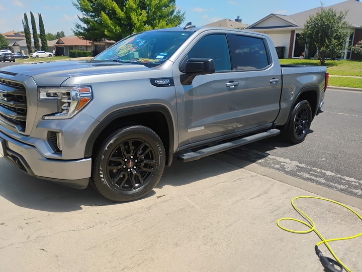 Freshly detailed full-size pickup in a driveway