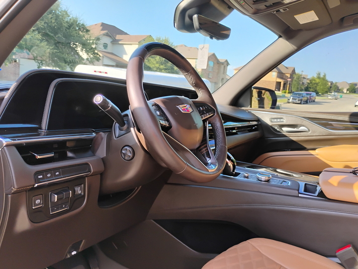 Detailed luxury SUV interior — clean leather and dash